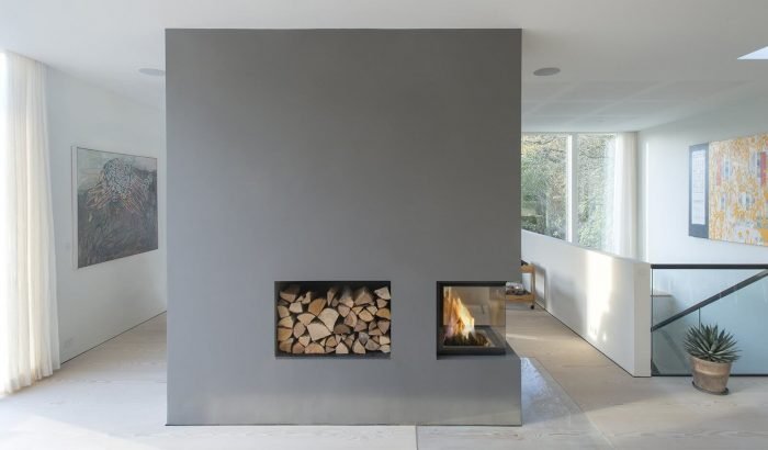 Modern Minimalist Fireplace With Wood Storage